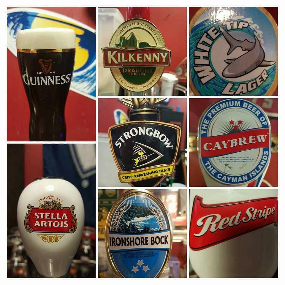 Draft beer taps at PD's Cayman — Caybrew, Guinness, Stella